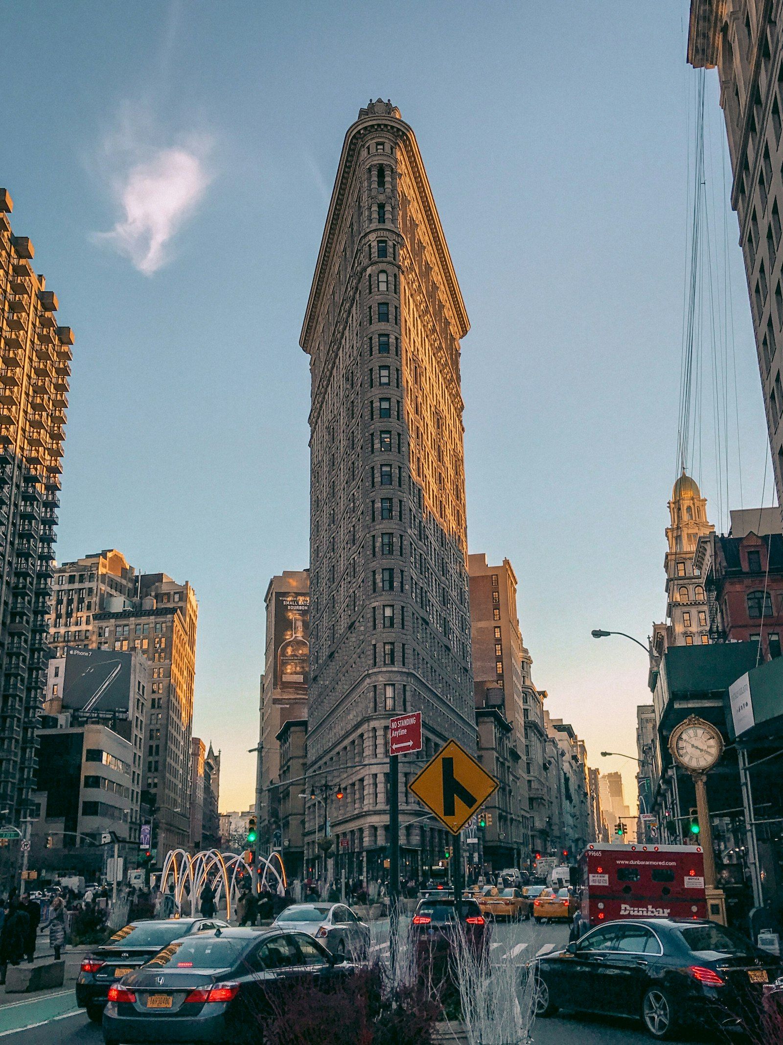 The Flatiron Building with taxis on Fifth Avenue